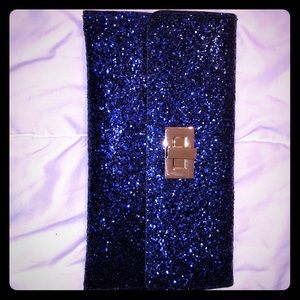 Blue sequin clutch with gold clasp
